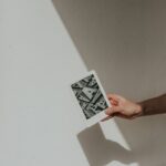 modern minimalist photo of a hand holding device